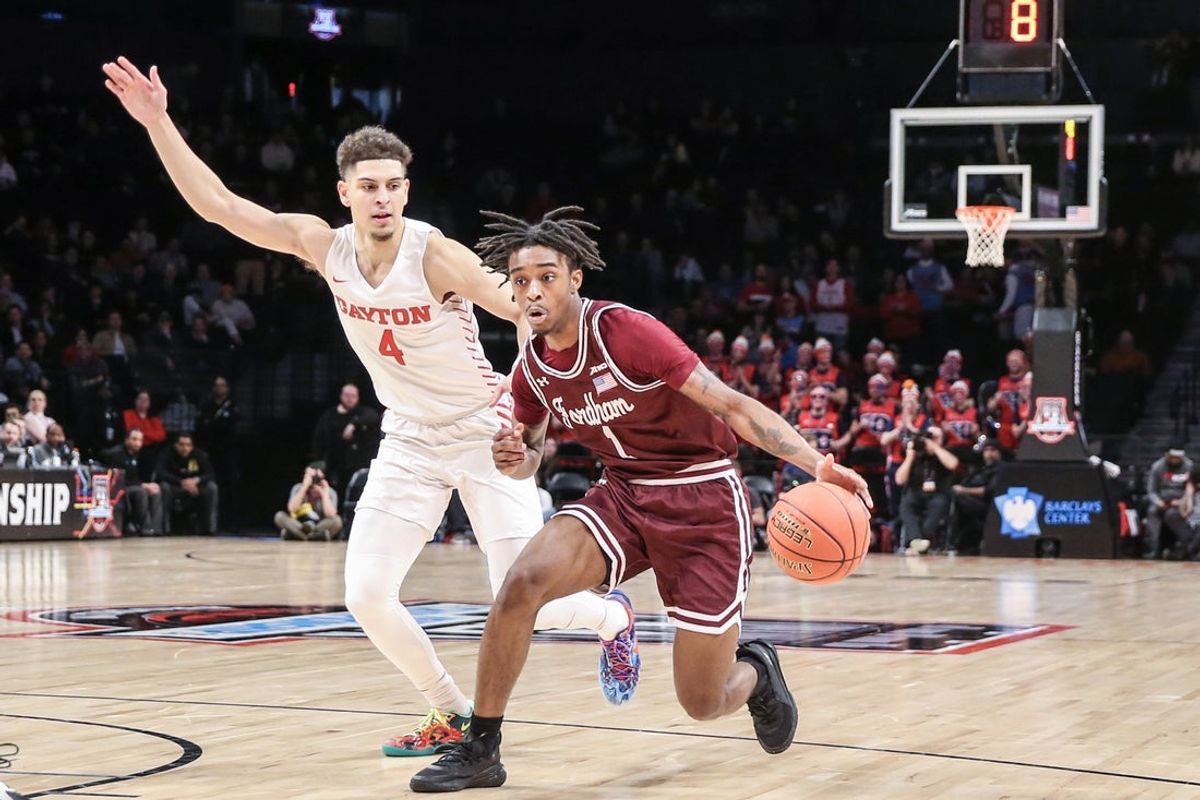 Mar 11, 2023; Brooklyn, NY, USA;  Fordham Rams guard Will Richardson (1) looks to drive past Dayton Flyers guard Koby Brea (4) in the second half at Barclays Center. Mandatory Credit: Wendell Cruz-Imagn Images
