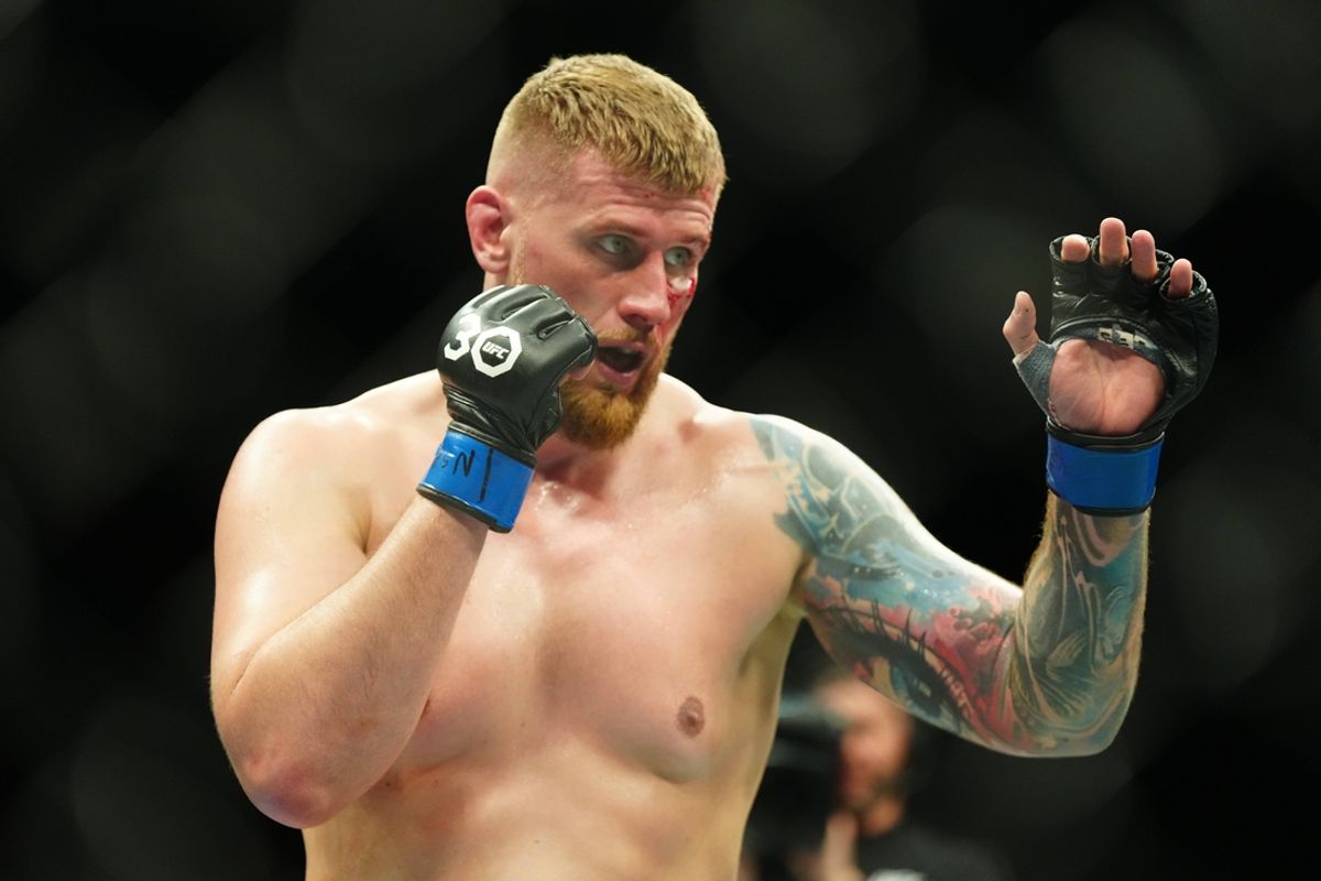 Mar 11, 2023; Las Vegas, Nevada, USA; Karl Williams (red gloves) fights Lukasz Brzeski (blue gloves) during UFC Fight Night at Virgin Hotel. Mandatory Credit: Ron Chenoy-Imagn Images