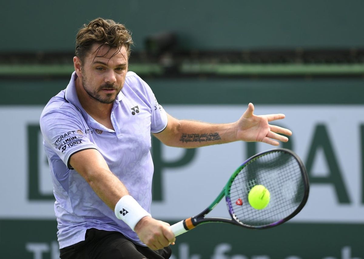 Mar 11, 2023; Indian Wells, CA, USA; Stan Wawrinka (SUI) hits a backhand during his 2nd round match against Miormir Kecmanovic (SRB) (not pictured) during the BNP Paribas Open at Indian Wells Tennis Garden. Mandatory Credit: Jonathan Hui-Imagn Images