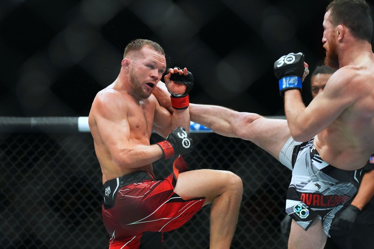 Mar 11, 2023; Las Vegas, Nevada, USA; Petr Yan (red gloves) fights Merab Dvalshvili (blue gloves) during UFC Fight Night at Virgin Hotel. Mandatory Credit: Ron Chenoy-Imagn Images