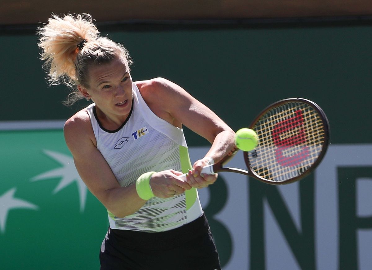 Katerina Siniakova hits a shot in the doubles finals match against Beatriz Hadda Maia and Laura Siegemund during the BNP Paribas Open at the Indian Wells Tennis Garden in Indian Wells, Calif., March 18, 2023.

Bnp Saturday 4