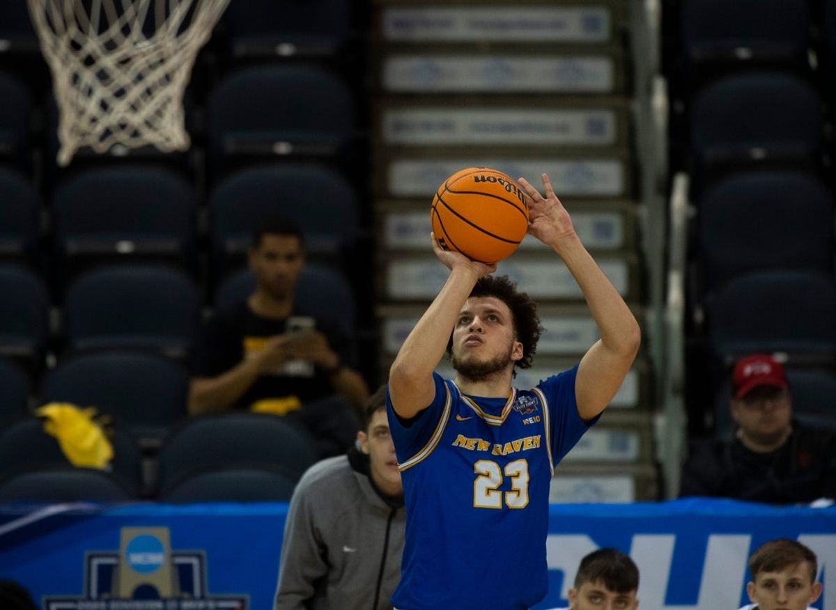 New Haven's Sean Braithwaite (23) eyes a three-point shot as the New Haven Chargers play the West Liberty Hilltoppers during the quarterfinal round of the 2023 NCAA Division II Men   s Elite Eight tournament at Ford Center in Downtown Evansville, Ind., Tuesday afternoon, March 21, 2023.

Mb Ncaadii8 32