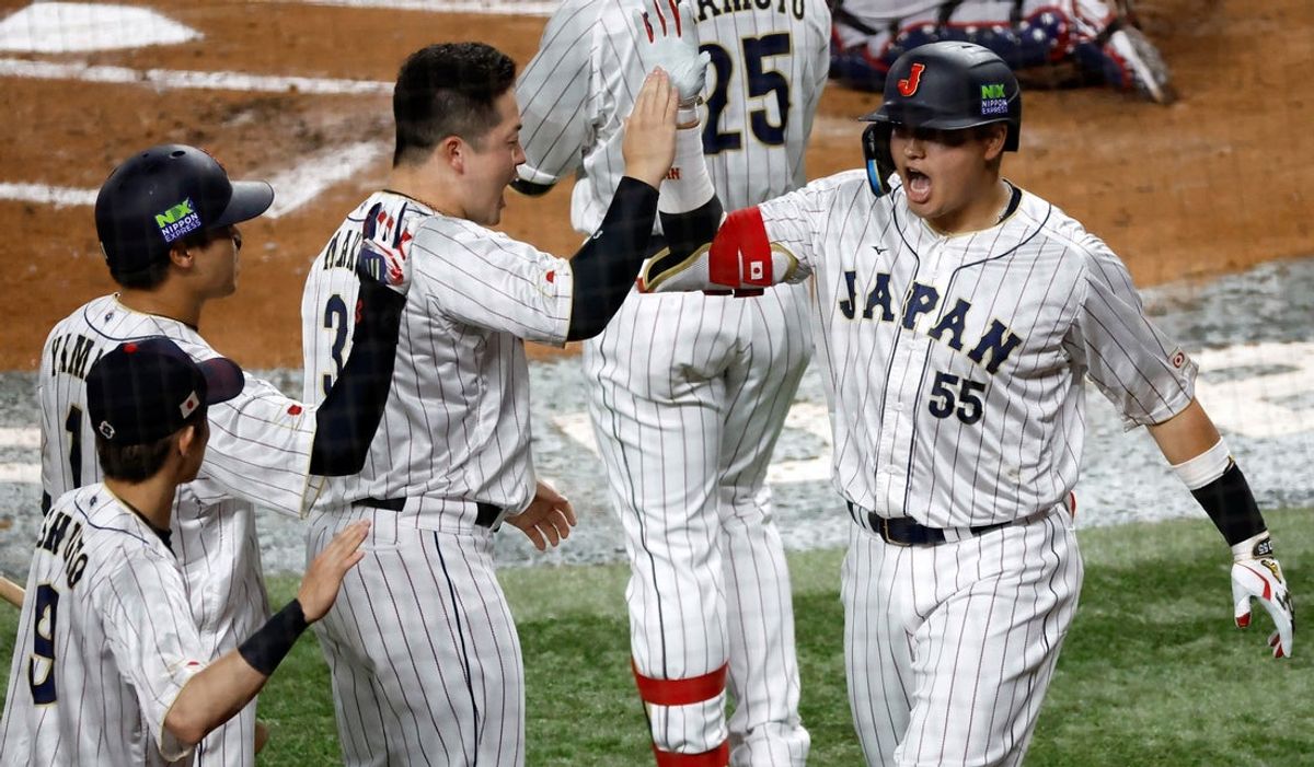 Mar 21, 2023; Miami, Florida, USA; Japan third baseman Munetaka Murakami (55) celebrates home run against the USA in the second inning at LoanDepot Park. Mandatory Credit: Rhona Wise-Imagn Images