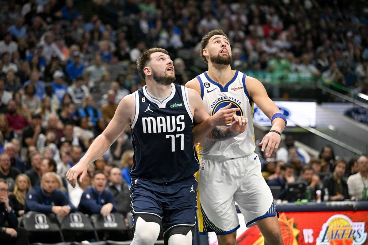 Dallas Mavericks guard Luka Doncic (77) and Golden State Warriors guard Klay Thompson (11) in action during the game between the Dallas Mavericks and the Golden State Warriors at the American Airlines Center. Mandatory Credit: Jerome Miron-USA TODAY Sports