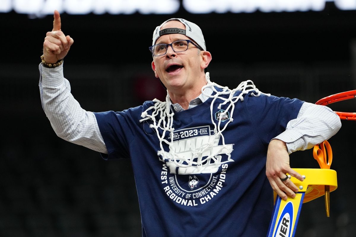 Mar 25, 2023; Las Vegas, NV, USA; Connecticut Huskies head coach Dan Hurley reacts after cutting down the net following a victory against the Gonzaga Bulldogs in the NCAA tournament West Regional final at T-Mobile Arena. Mandatory Credit: Stephen R. Sylvanie-Imagn Images