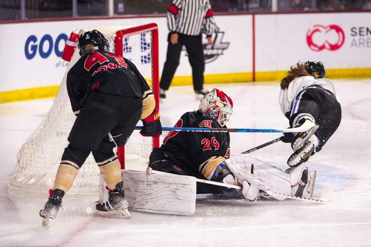 Minnesota Whitecaps forward Jonna Albers (3), at right, is tripped by Toronto Six goaltender Elaine Chuli (29), at center, as Toronto Six forward Brittany Howard (41), at left, guards the goal during the third period against the Toronto Six during the Isobel Cup final at the Mullett Arena on Sunday, March 26, 2023, in Tempe.

Uscp 7pictbdvswwz0aia14jq Original