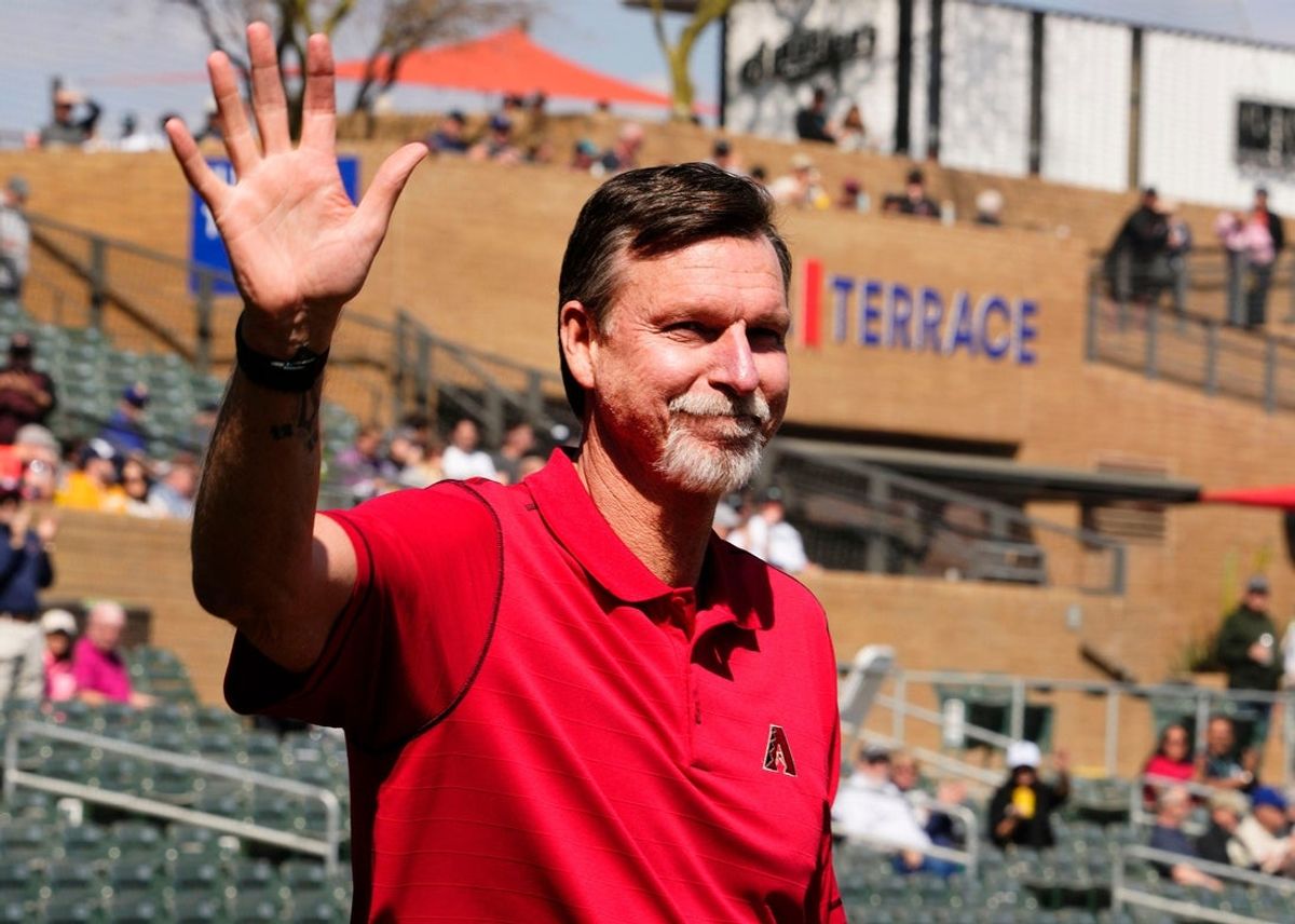 Mar 3, 2023; Scottsdale, AZ, USA; Former Arizona Diamondbacks pitcher Randy Johnson waves to the crowd during a ceremony announcing his election into the Cactus League Hall of Fame during a spring training game at Salt River Fields. Mandatory Credit: Rob Schumacher-Arizona Republic

Mlb Diamondbacks Mariners Game