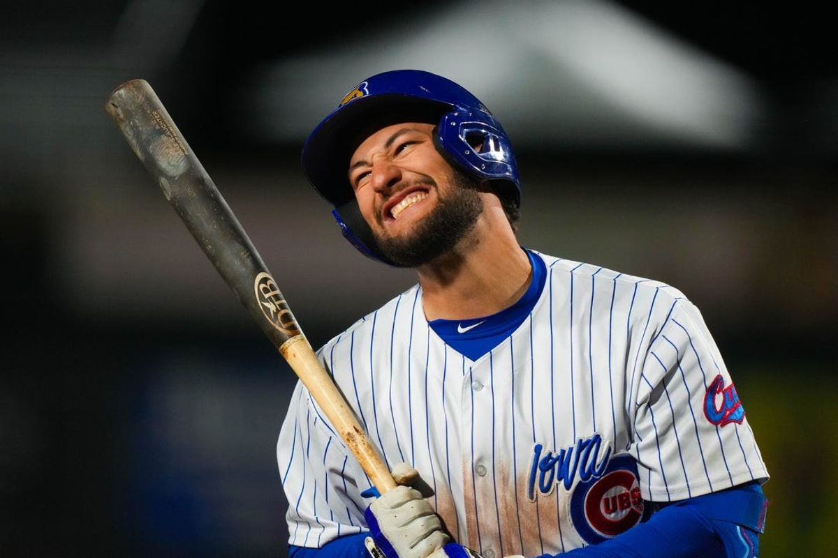 Iowa Cubs third baseman Jake Slaughter (28) reacts to striking out during the season opener at Principal Park in Des Moines on Friday, March 31, 2023. The Cubs defeated the Clippers, 11-5.