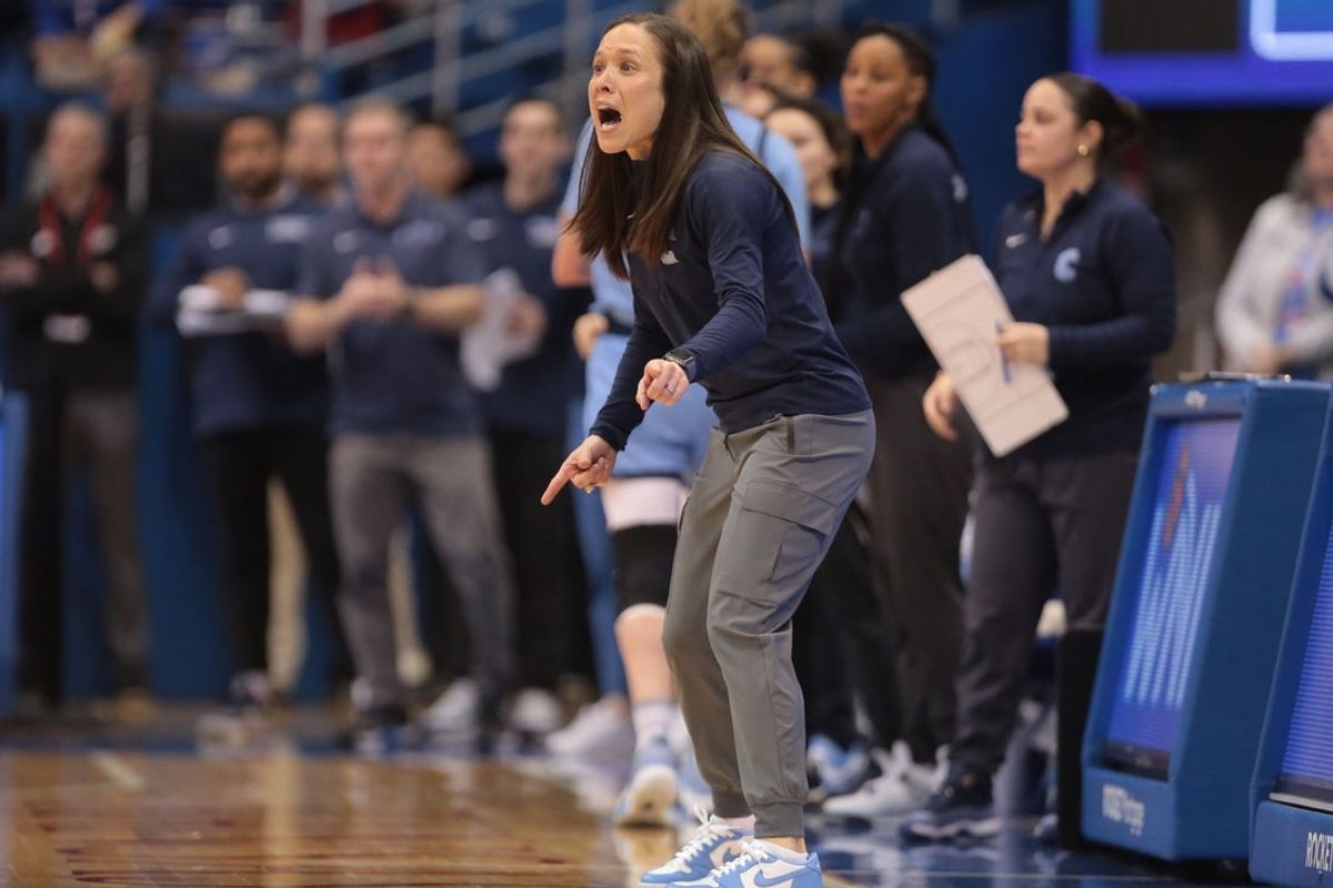 Columbia coach Megan Griffith yells out to plays in the first quarter of Saturday's WNIT championship game against Kansas inside Allen Fieldhouse.