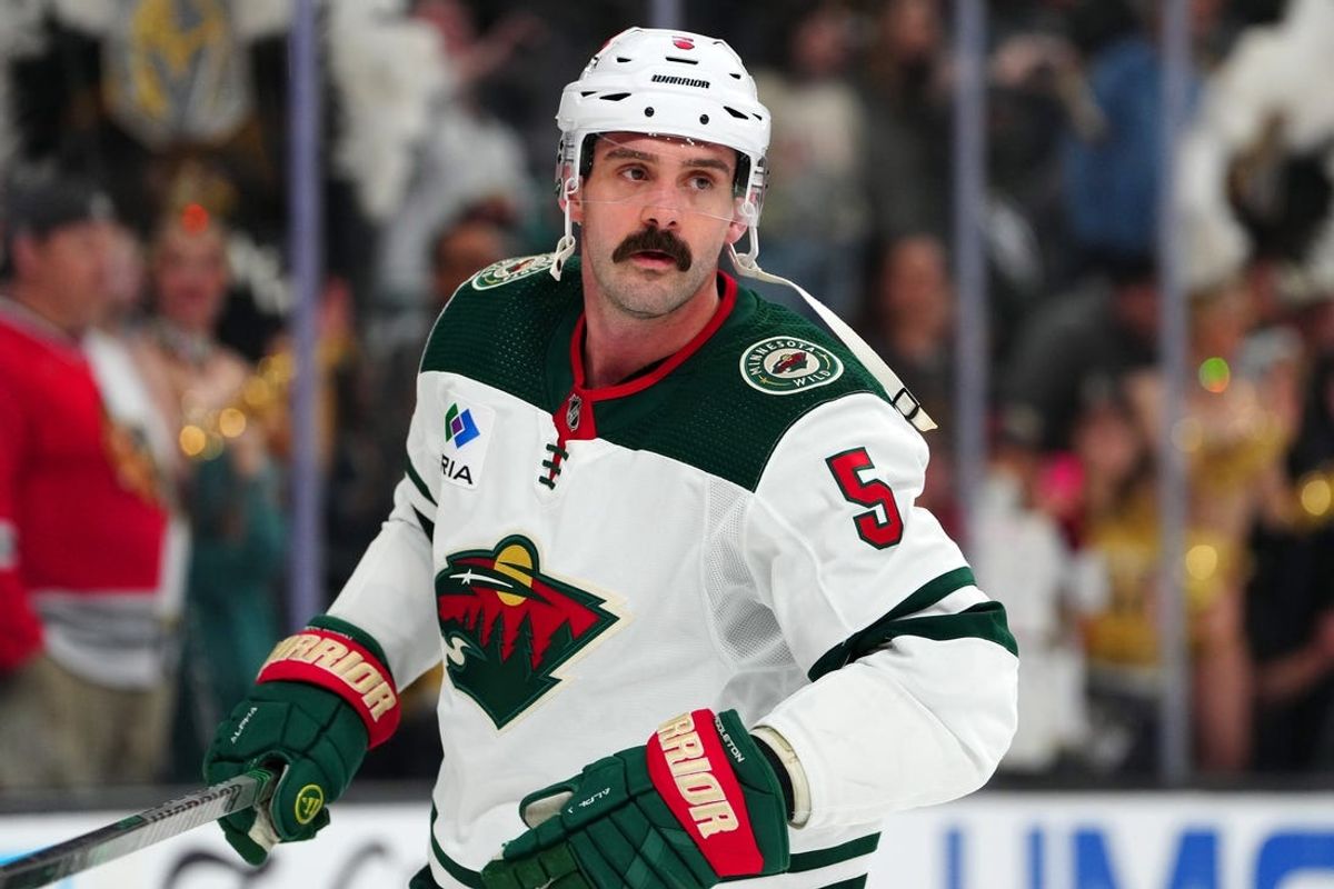 Apr 1, 2023; Las Vegas, Nevada, USA; Minnesota Wild defenseman Jake Middleton (5) warms up before a game against the Vegas Golden Knights at T-Mobile Arena. Mandatory Credit: Stephen R. Sylvanie-USA TODAY Sports