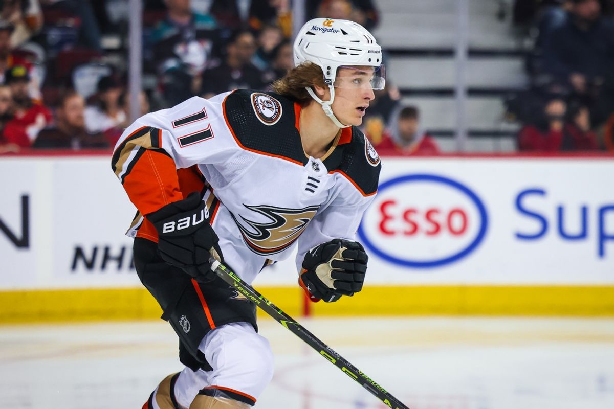 Apr 2, 2023; Calgary, Alberta, CAN; Anaheim Ducks center Trevor Zegras (11) skates against the Calgary Flames during the first period at Scotiabank Saddledome. Mandatory Credit: Sergei Belski-Imagn Images
