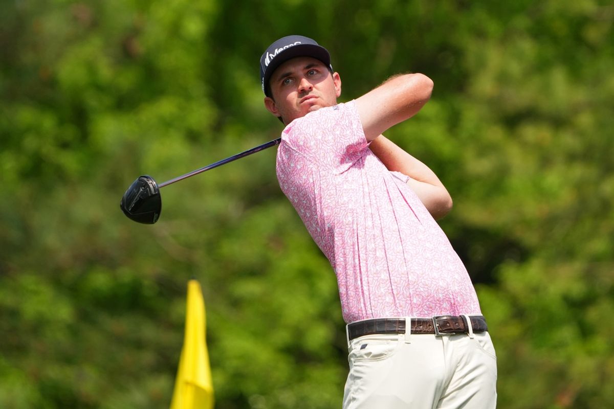 Apr 6, 2023; Augusta, Georgia, USA; JT Poston tees off on the fifth hole during the first round of The Masters golf tournament. Mandatory Credit: Kyle Terada-USA TODAY Network