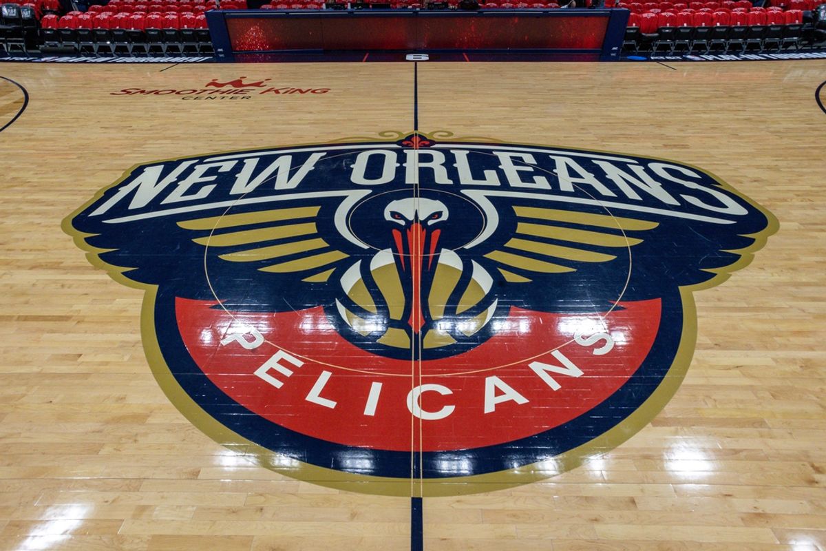 Apr 12, 2023; New Orleans, Louisiana, USA; Detailed view of the New Orleans Pelicans logo at mid court before the Play-In game against the Oklahoma City Thunder at Smoothie King Center. Mandatory Credit: Stephen Lew-Imagn Images
