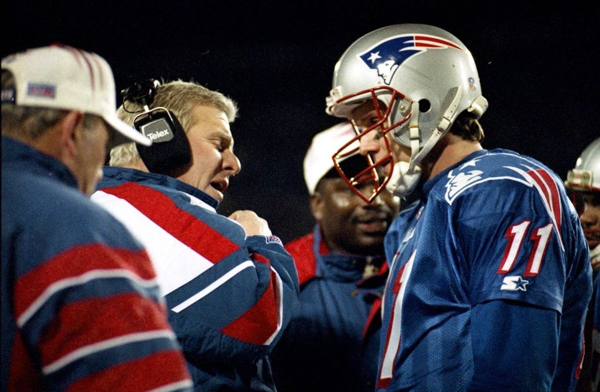 ORG XMIT:  Patriots head coach Bill Parcells confers on the sideline with  quarterback Drew Bledsoe during the game. Pats vs. Jacksonville Jaguars, 1/12/97. Journal photo by Glenn Osmundson.

Old Pats 2