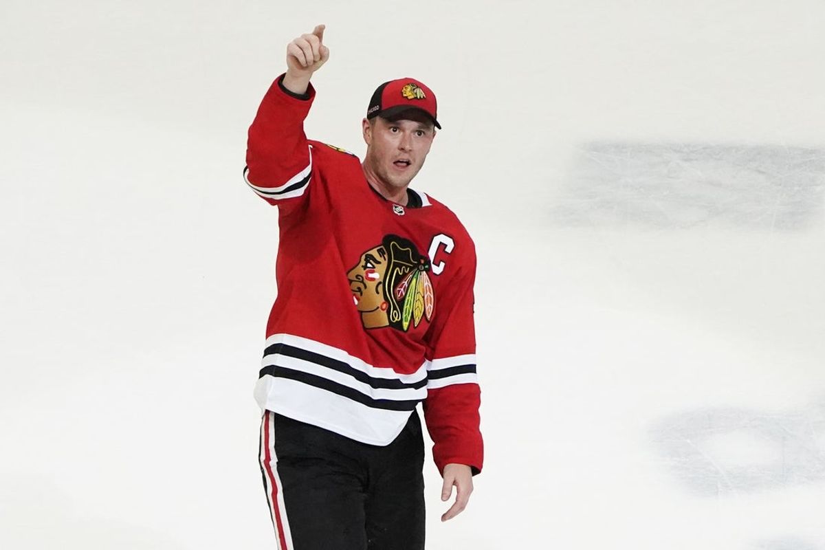 Apr 13, 2023; Chicago, Illinois, USA; Chicago Blackhawks center Jonathan Toews (19) is honored after the game against the Philadelphia Flyers. He played his last game as a Blackhawk, at United Center. Mandatory Credit: David Banks-Imagn Images