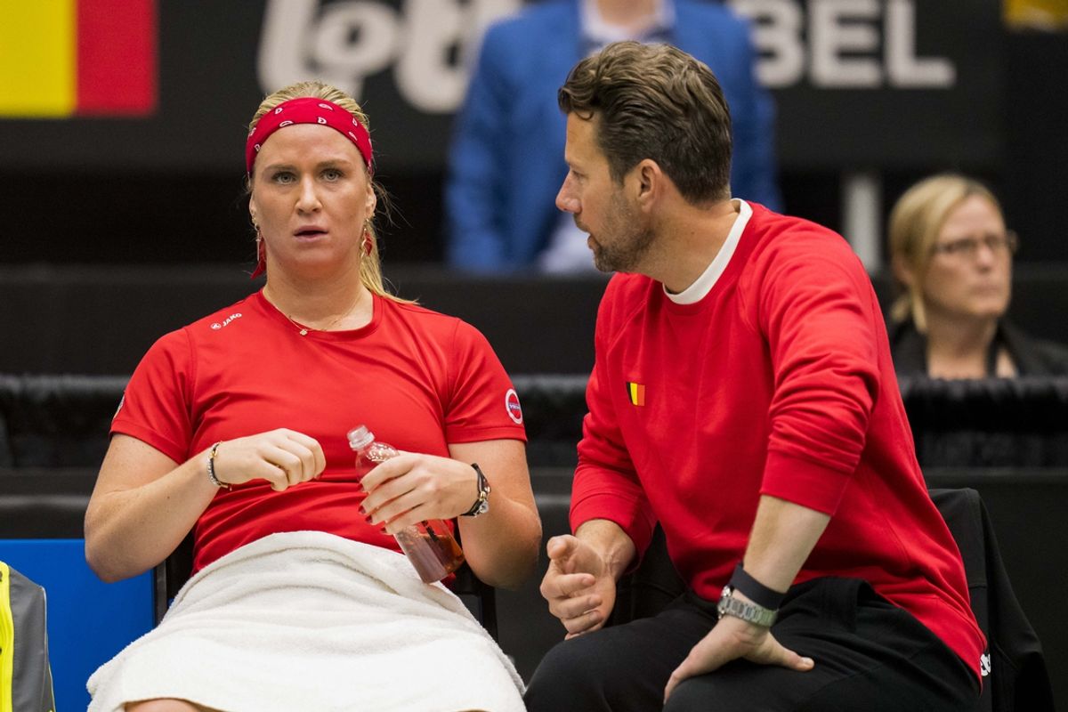 Apr 14, 2023; Vancouver, British Columbia, CAN; Belgium Team Captain Wim Fissette chats with Ysaline Bonaventure in her singles match with Rebecca Marino of Canada during the Billie Jean King Cup Qualifiers at the Pacific Coliseum. Ysaline Bonaventure of Belgium won 2 sets to 1.  Mandatory Credit: Bob Frid-Imagn Images