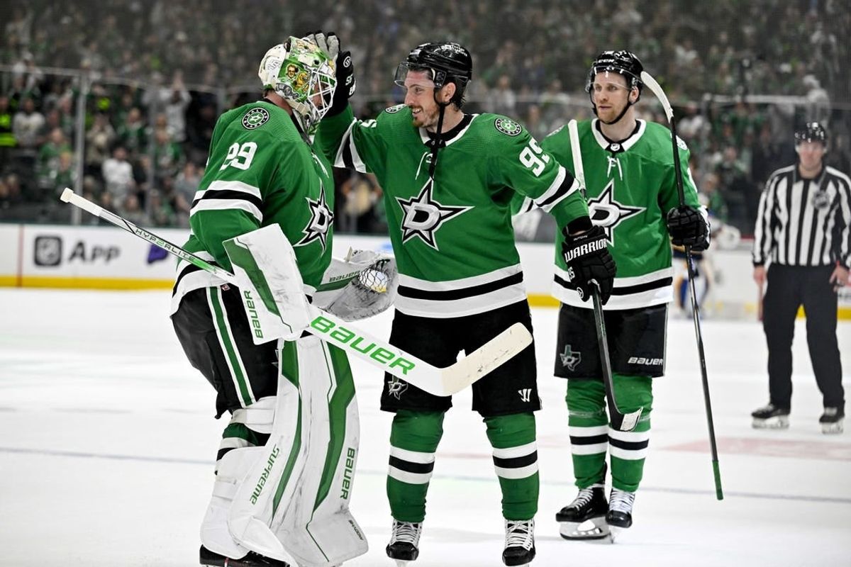 Apr 17, 2024; Dallas, Texas, USA; Dallas Stars goaltender Jake Oettinger (29) and center Matt Duchene (95) and center Radek Faksa (12) celebrates after the Stars defeat the St. Louis Blues during the overtime shootout at the American Airlines Center.