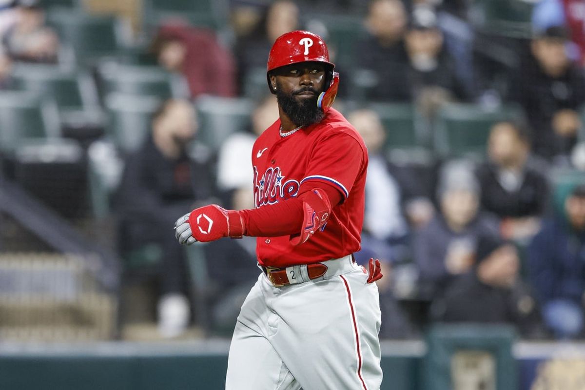 Apr 18, 2023; Chicago, Illinois, USA; Philadelphia Phillies second baseman Josh Harrison (2) reacts after striking out against the Chicago White Sox during the eight inning of game two of the doubleheader at Guaranteed Rate Field. Mandatory Credit: Kamil Krzaczynski-Imagn Images