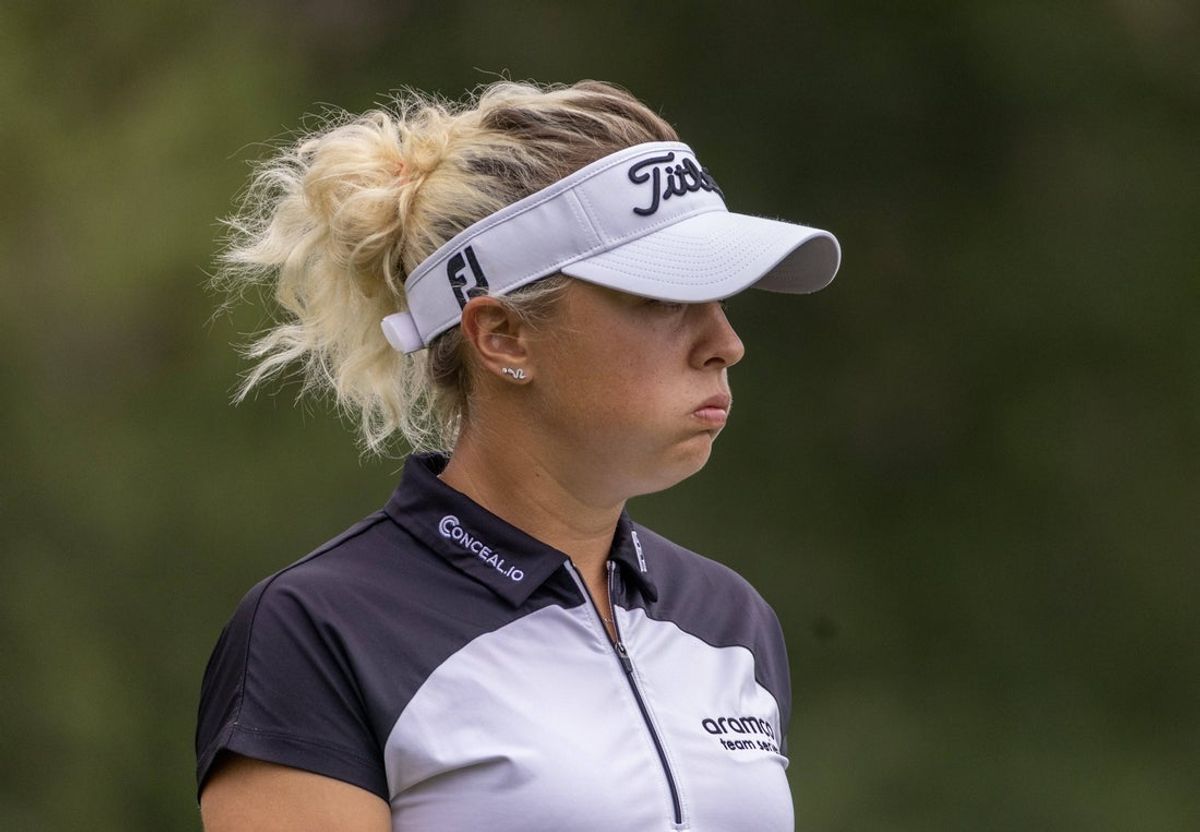 Apr 20, 2023; The Woodlands, Texas, USA; Pauline Roussin (FRA) reacts after hitting her tee shot on the third tee during the first round of The Chevron Championship golf tournament. Mandatory Credit: Thomas Shea-Imagn Images