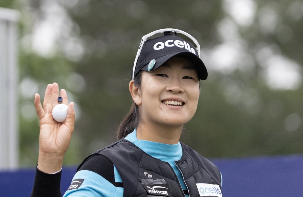 Apr 23, 2023; The Woodlands, Texas, USA;  A Lim Kim (KOR) waves to fans as she is introduced on the first tee during the final round of The Chevron Championship golf tournament. Mandatory Credit: Thomas Shea-Imagn Images