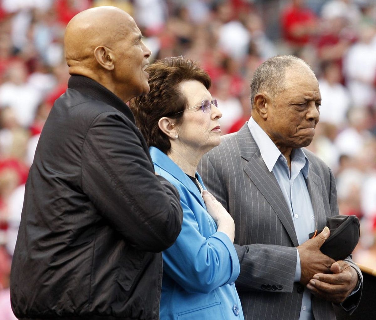CIVIL RIGHT PREGAME METRO SATURDAY MAY 15, 2010. Harry Belafonte, actor and activist during the singing of the National Anthem, left, Billie Jean King,  39-time Grand Slam title winner and Willie Mays, Baseball Hall of Famer during pregame ceremonies of the Civil Rights Game at Great American Ball Park. The three were honored during for MLB Beacon Awards. Photo shot Saturday May 15, 2010. The Enquirer/ Cara Owsley

Pregame5