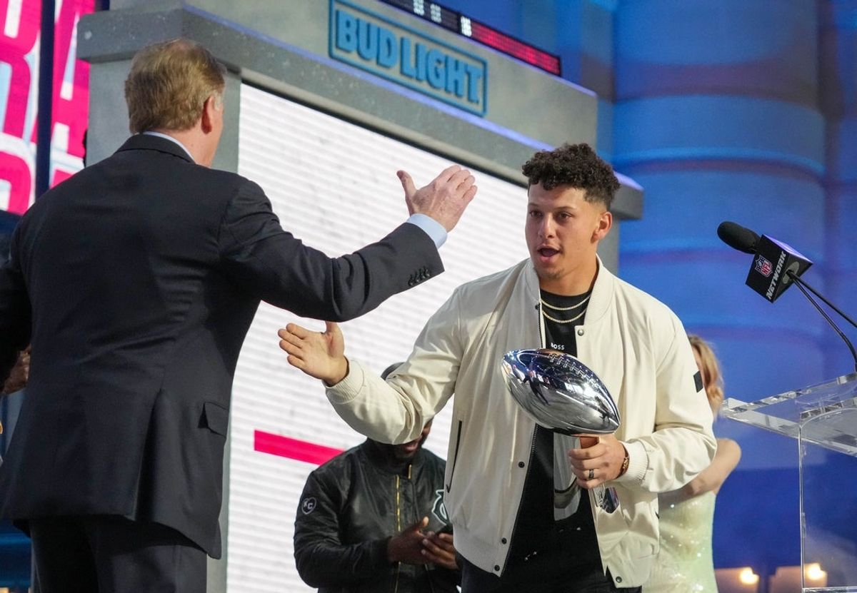 Kansas City Chiefs quarterback Patrick Mahomes greets NFL commissioner Roger Goodell during the first round of the 2023 NFL Draft at Union Station. Mandatory Credit: Kirby Lee-Imagn Images