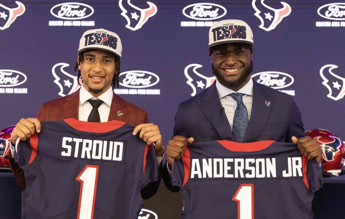 Apr 28, 2023; Houston, TX, USA; From left to right, Houston Texans quarterback CJ Stroud (left), second overall pick in the 2023 NFL Draft, and Texans linebacker Will Anderson Jr., third overall pick in the 2023 NFL Draft, pose for a photo at a press conference at NRG Stadium. Mandatory Credit: Thomas Shea-Imagn Images