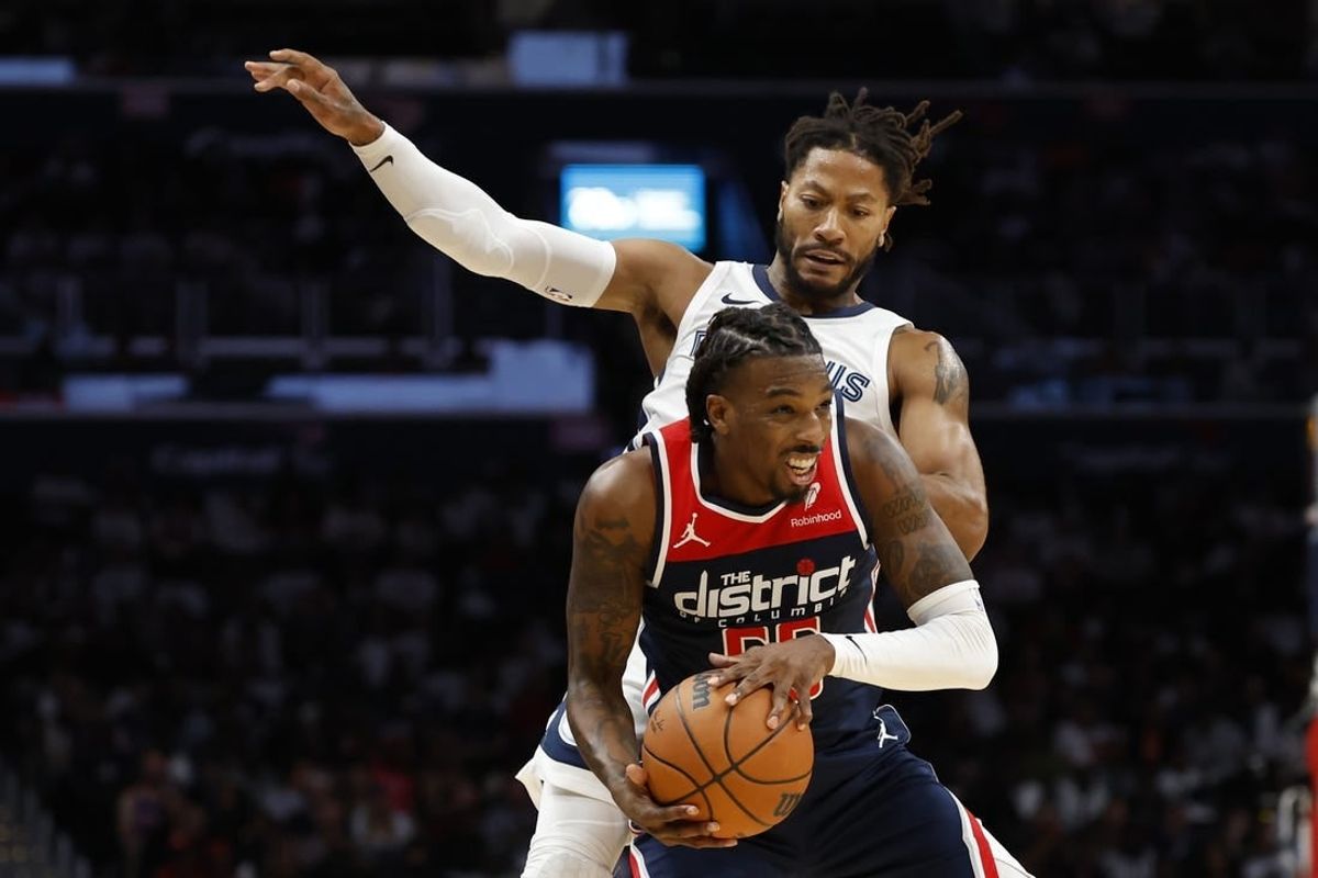 Oct 28, 2023; Washington, District of Columbia, USA; Washington Wizards guard Delon Wright (55) steals a pass intended for Memphis Grizzlies guard Derrick Rose (23) in the fourth quarter at Capital One Arena.