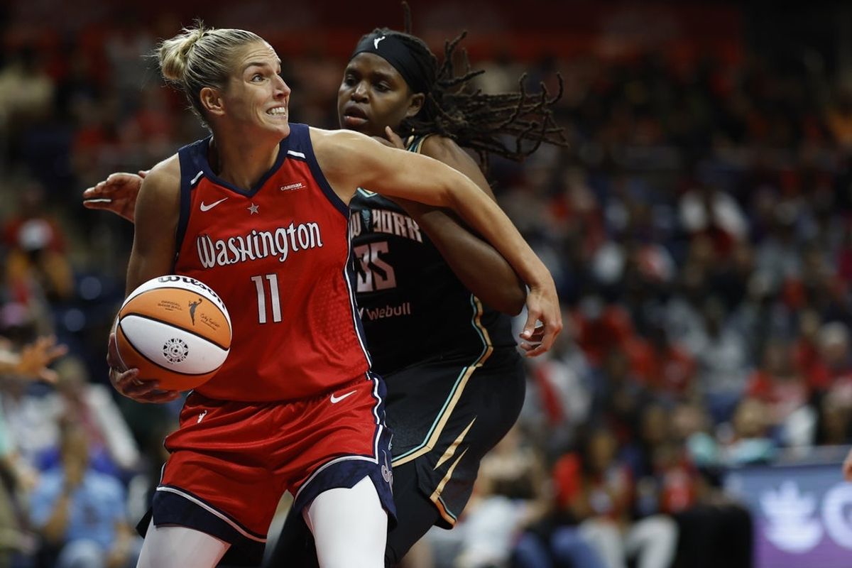 May 19, 2023; Washington, District of Columbia, USA; Washington Mystics forward Elena Delle Donne (11) drives to the basket as New York Liberty forward Jonquel Jones (35) defends in the third quarter at Entertainment & Sports Arena. Mandatory Credit: Geoff Burke-Imagn Images
