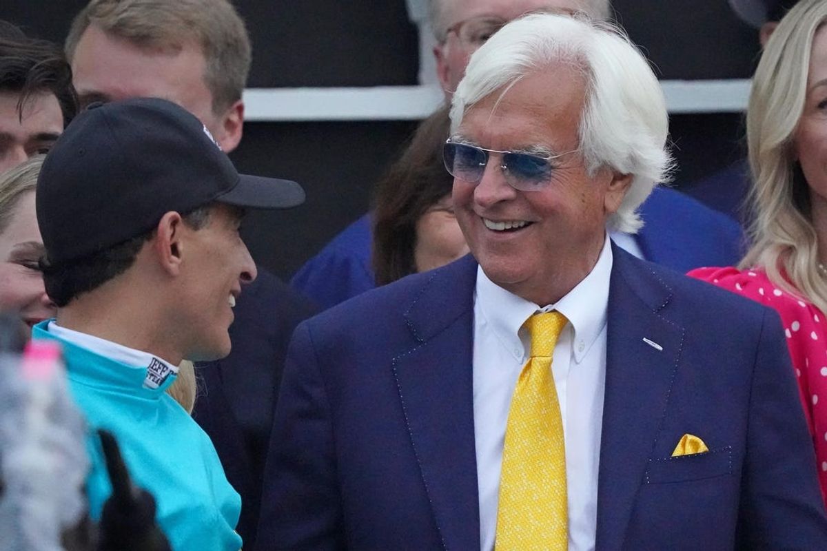 May 20, 2023; Baltimore, Maryland, USA; Natural Treasure trainer Bob Baffert, right, and jockey John Velazquez in the winner s circle following their victory in the 148th running of the Preakness Stakes at Pimlico Race Course. Mandatory Credit: Mitch Stringer-USA TODAY Sports
