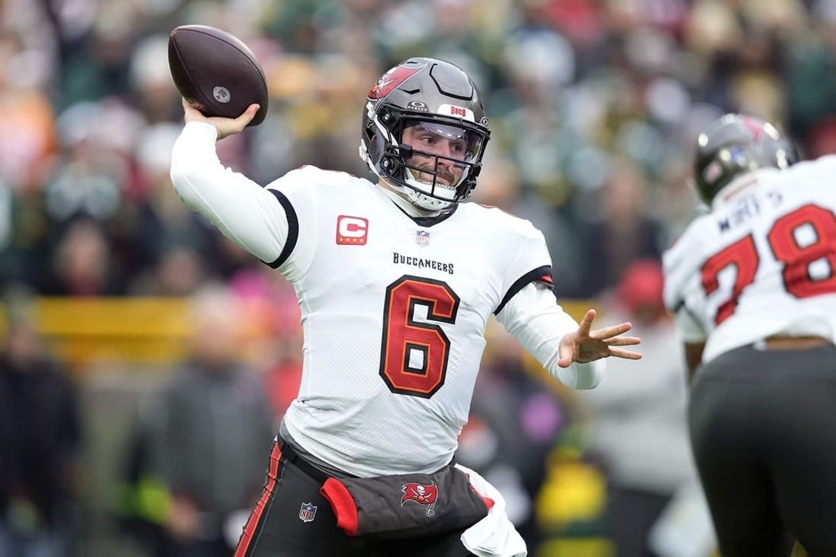 Dec 17, 2023; Green Bay, Wisconsin, USA;  Tampa Bay Buccaneers quarterback Baker Mayfield (6) throws a pass during the first quarter against the Green Bay Packers at Lambeau Field.