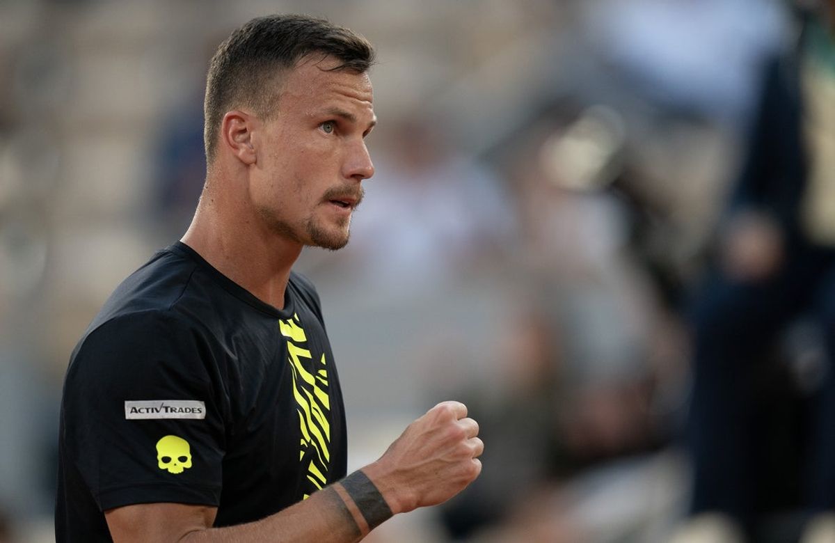 May 31, 2023; Paris,France; Marton Fucsovics (HUN) reacts to a point during his match against Novak Djokovic (SRB) on day four at Stade Roland-Garros. Mandatory Credit: Susan Mullane-Imagn Images