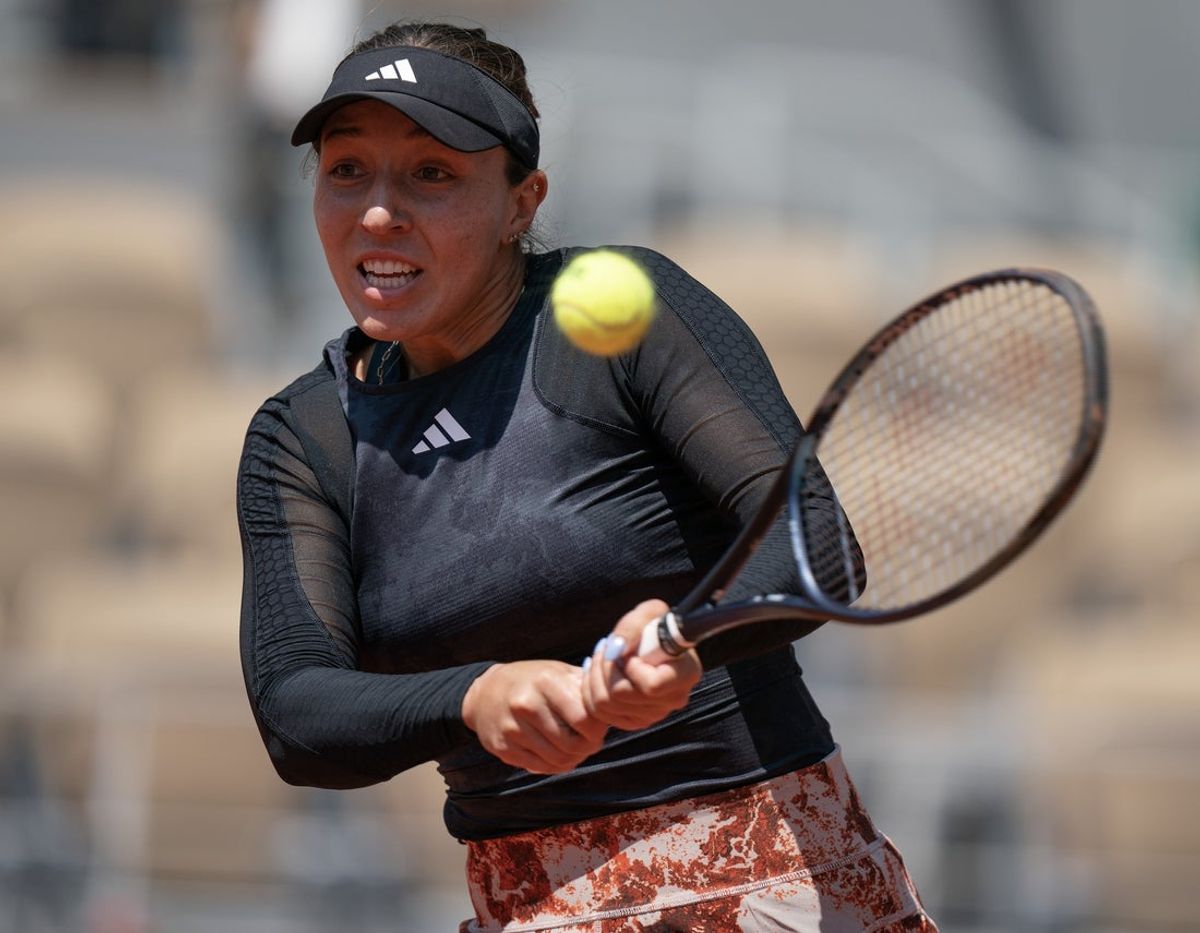 Jun 2, 2023; Paris,France; Jessica Pegula (USA) returns a shot during her match against Elise Mertens (BEL) on day six at Stade Roland-Garros. Mandatory Credit: Susan Mullane-Imagn Images