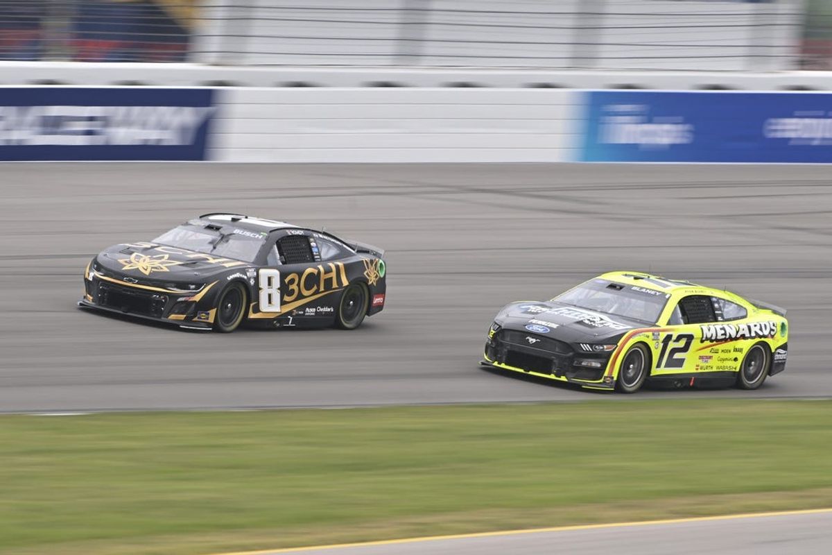 Jun 4, 2023; Madison, Illinois, USA; NASCAR Cup Series driver Kyle Busch (8) leads NASCAR Cup Series driver Ryan Blaney (12) during the Enjoy Illinois 300 at World Wide Technology Raceway. Mandatory Credit: Joe Puetz-USA TODAY Sports