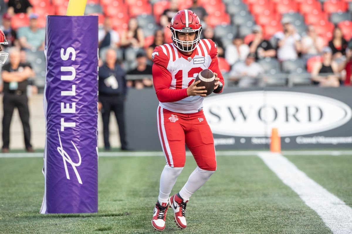 Jun 15, 2023; Ottawa, Ontario, CAN; Quarteback Jake Maier of the Calgary Stampeders (12) is forced to play from the end zone following a failed drive by the Ottawa Redblacks in the first half at TD Place. Mandatory Credit: Marc DesRosiers-Imagn Images