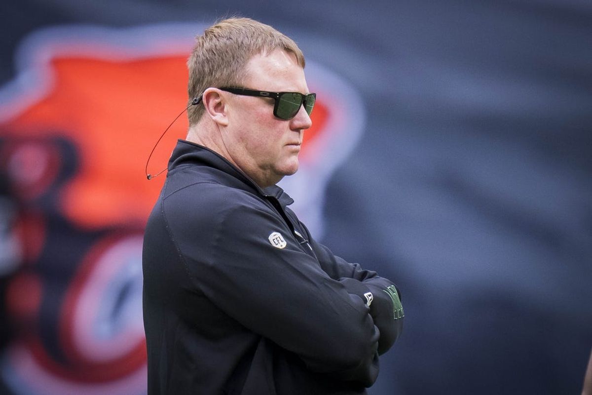 Jun 17, 2023; Vancouver, British Columbia, CAN; Edmonton Elks head coach and general manager Chris Jones watches his players during warm up prior to a game against the BC Lions at BC Place. Mandatory Credit: Bob Frid-USA TODAY Sports