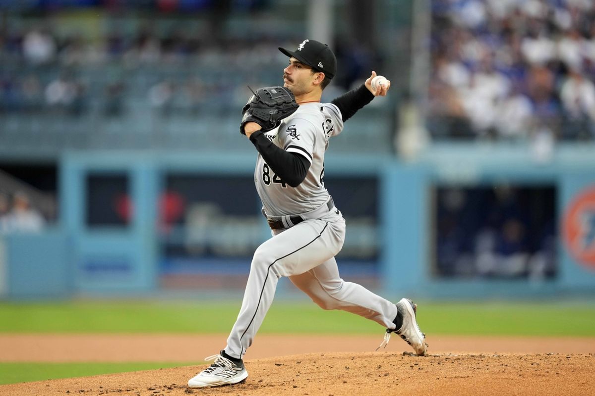 Jun 15, 2023; Los Angeles, California, USA; Chicago White Sox starting pitcher Dylan Cease (84) throws in the first inning against the Los Angeles Dodgers at Dodger Stadium. Mandatory Credit: Kirby Lee-Imagn Images
