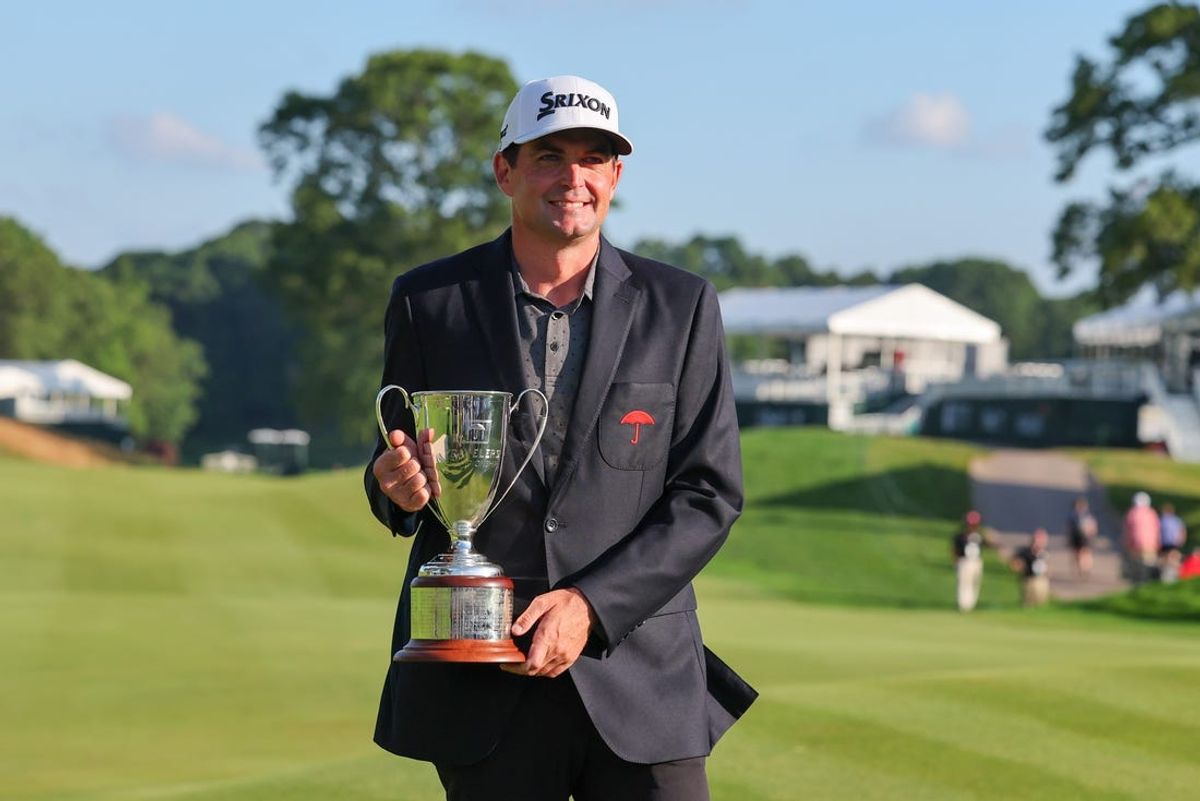 Jun 25, 2023; Cromwell, Connecticut, USA; Keegan Bradley poses with the winner's trophy after the final round of the Travelers Championship golf tournament. Mandatory Credit: Vincent Carchietta-USA TODAY Sports