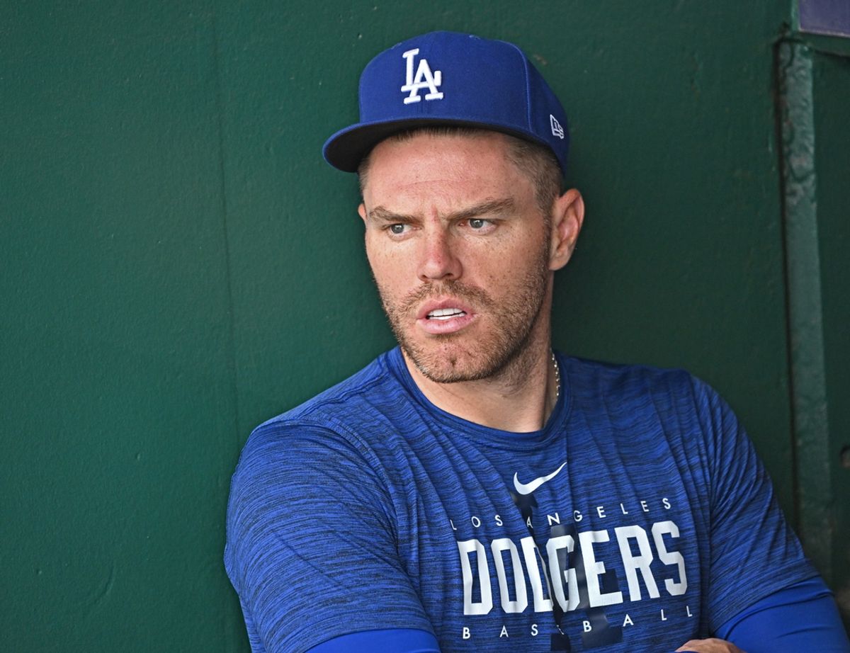 Jul 1, 2023; Kansas City, Missouri, USA;  Los Angeles Dodgers first baseman Freddie Freeman (5) looks on from the dugout before a game against the Kansas City Royals at Kauffman Stadium. Mandatory Credit: Peter Aiken-Imagn Images