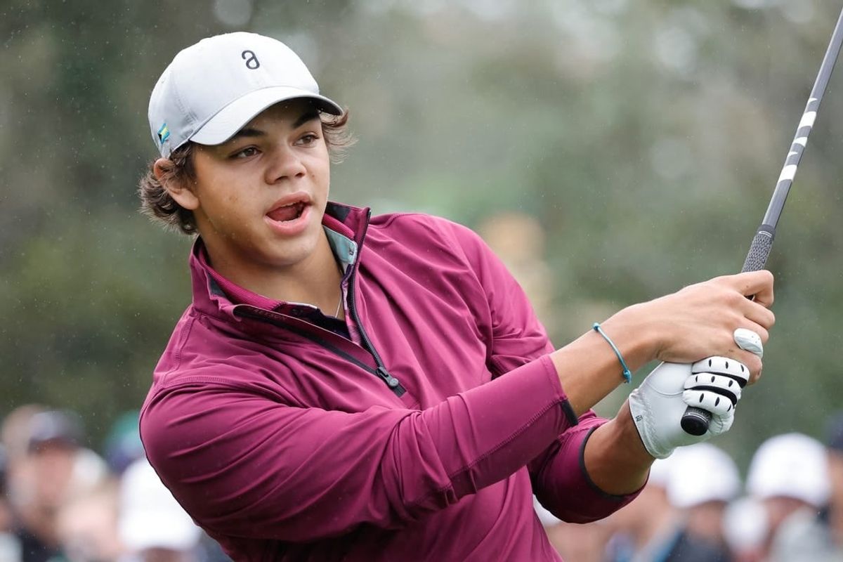 Dec 17, 2023; Orlando, Florida, USA;  Charlie Woods plays his shot from the first tee during the PNC Championship at The Ritz-Carlton Golf Club.