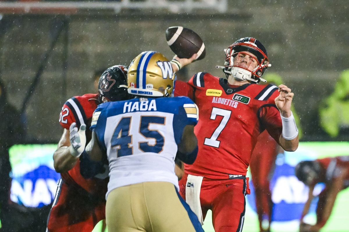 Jul 1, 2023; Montreal, Quebec, CAN; Montreal Alouettes quarterback Cody Fajardo (7) passes the ball against the Winnipeg Blue Bombers during the third quarter at Percival Molson Memorial Stadium. Mandatory Credit: David Kirouac-Imagn Images