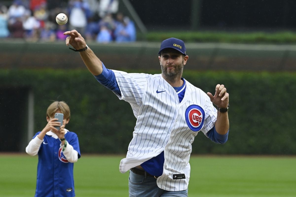 Jul 2, 2023; Chicago, Illinois, USA;  Former NFL quarterback Jay Cutler throws out a ceremonial first pitch before the game between the Chicago Cubs and the Cleveland Guardians at Wrigley Field. Mandatory Credit: Matt Marton-Imagn Images