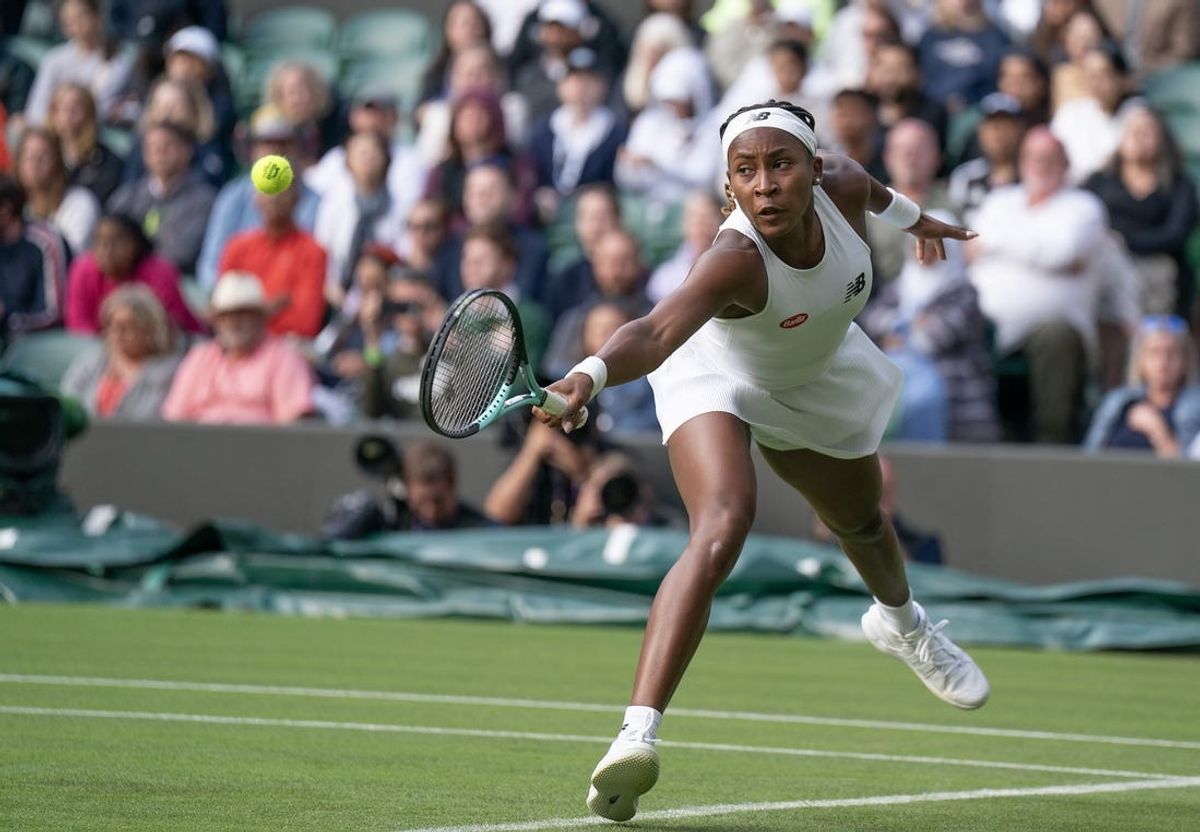 Jul 3, 2023; London, United Kingdom; Coco Gauff (USA) returns the ball against Sofia Kenin (USA) at the All England Lawn Tennis and Croquet Club. Mandatory Credit: Susan Mullane-USA TODAY Sports