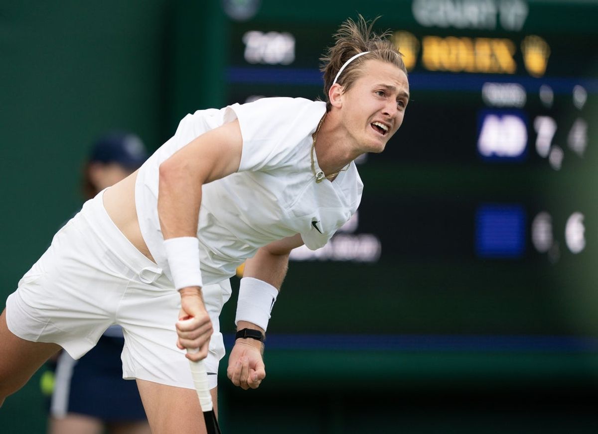 Jul 5, 2023; London, United Kingdom; Sebastian Korda (USA) serves against Jiri Vesely (CZE) on day three at the All England Lawn Tennis and Croquet Club.  Mandatory Credit: Susan Mullane-Imagn Images