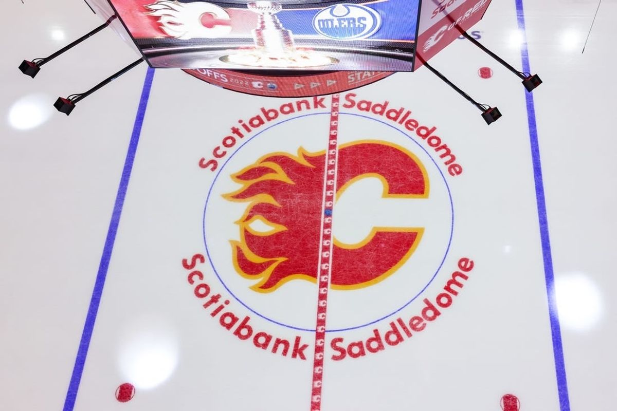 May 18, 2022; Calgary, Alberta, CAN; General view of the Calgary Flames logo on the ice prior to the game between the Calgary Flames and the Edmonton Oilers in game one of the second round of the 2022 Stanley Cup Playoffs at Scotiabank Saddledome.
