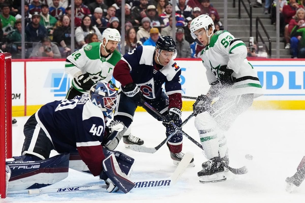 Apr 7, 2024; Denver, Colorado, USA; Dallas Stars center Wyatt Johnston (53) and Colorado Avalanche goaltender Alexandar Georgiev (40) and defenseman Jack Johnson (3) during the first period at Ball Arena.