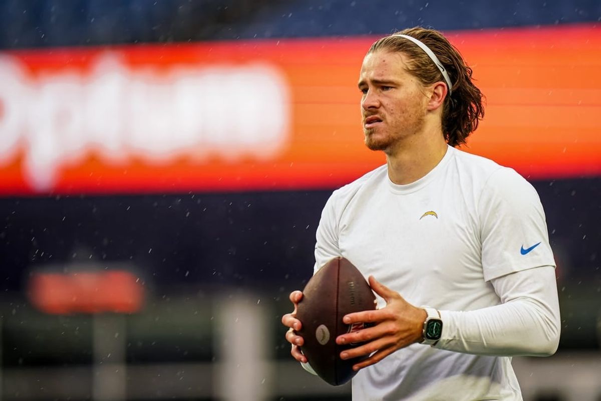 Dec 3, 2023; Foxborough, Massachusetts, USA; Los Angeles Chargers quarterback Justin Herbert (10) warm up before the start of the game against the New England Patriots at Gillette Stadium.