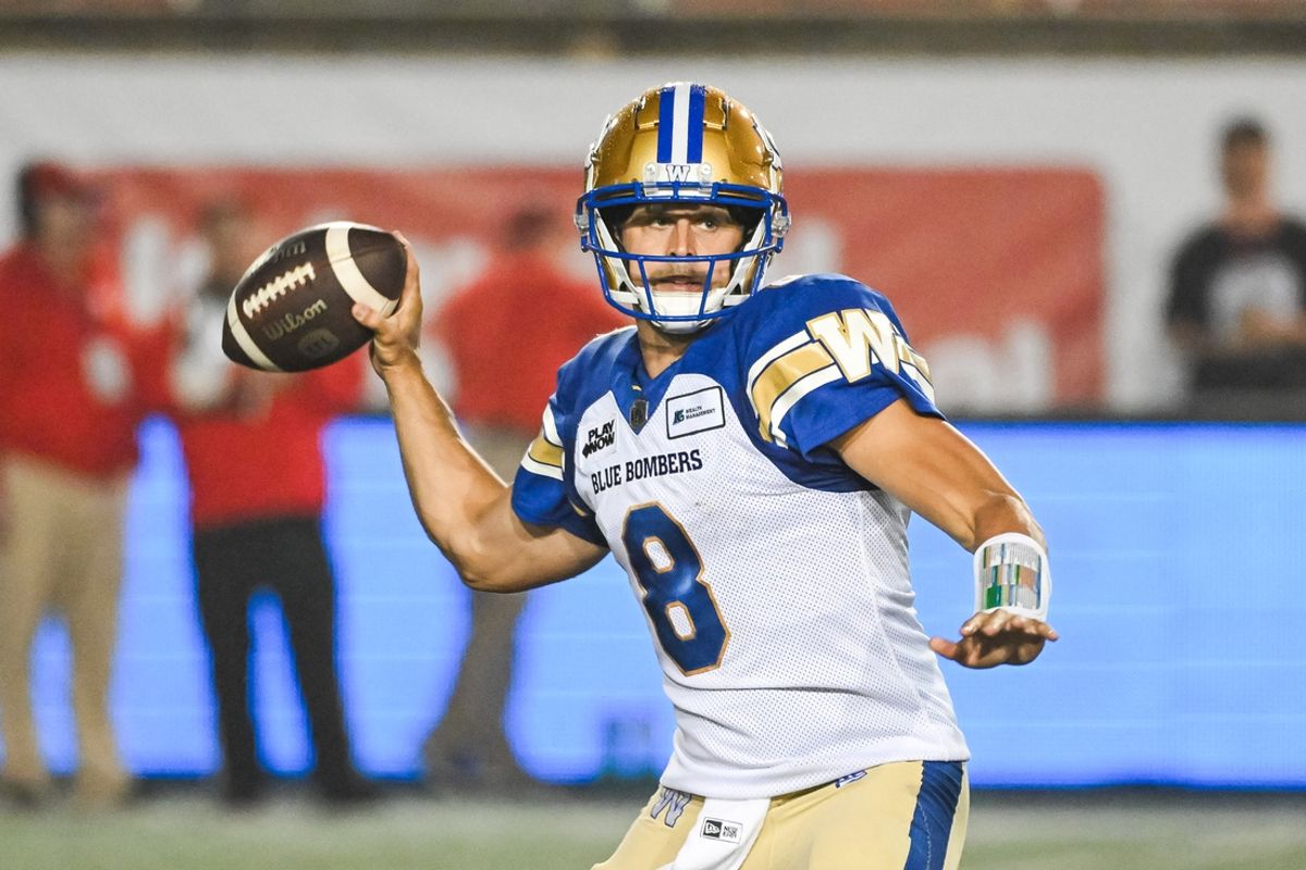 Jul 1, 2023; Montreal, Quebec, CAN; Winnipeg Blue Bombers quarterback Zach Collaros (8) passes the ball against the Montreal Alouettes during the first quarter at Percival Molson Memorial Stadium. Mandatory Credit: David Kirouac-Imagn Images