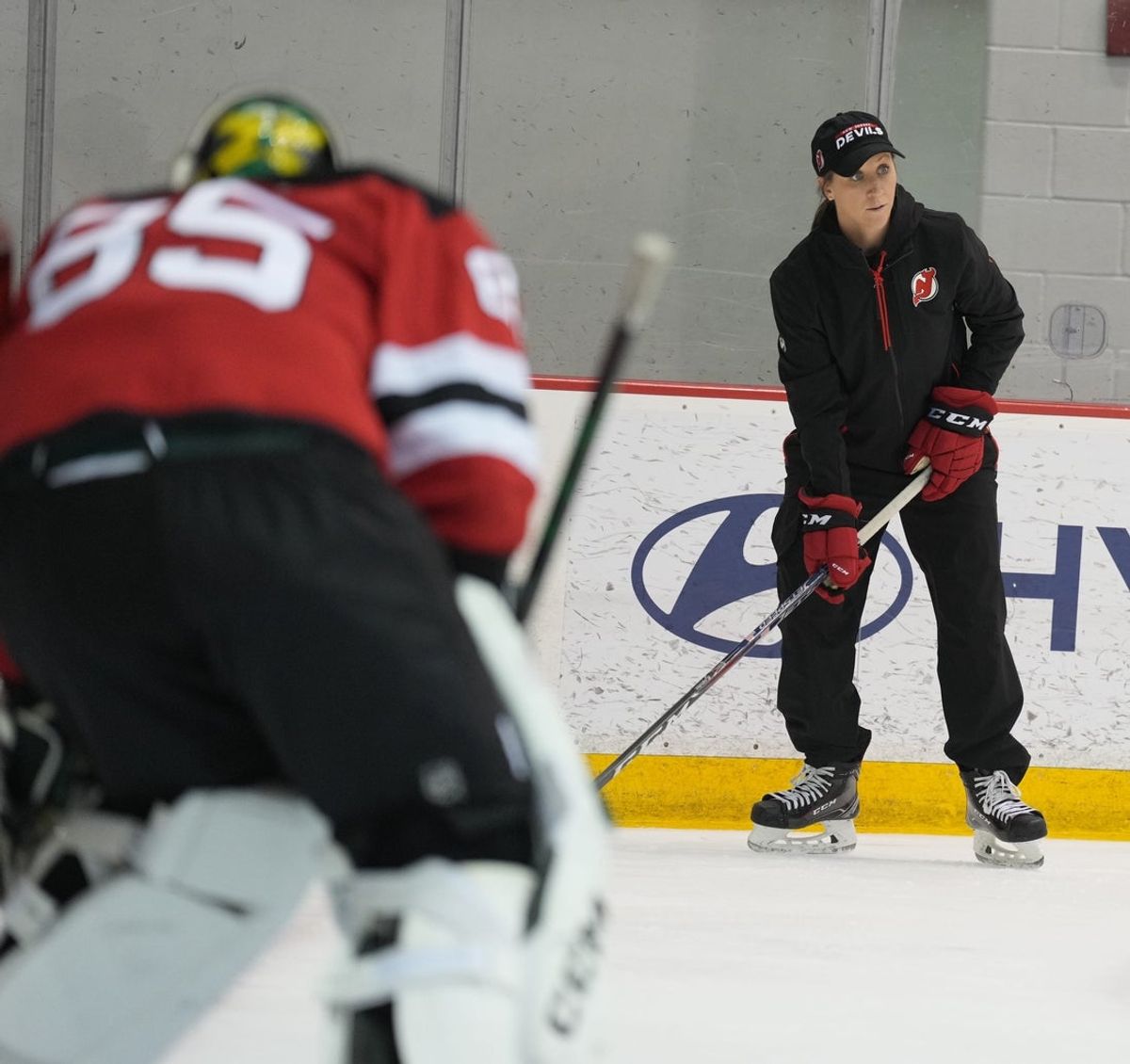 Newark, NJ July 11, 2023 --   Meghan Duggan, Devils Director of Player Development, participates in the NJ Devils 2023 Development Camp for young players and coaches at their RWJ Health Hockey House practice facility in Newark. The camp runs through Friday.
