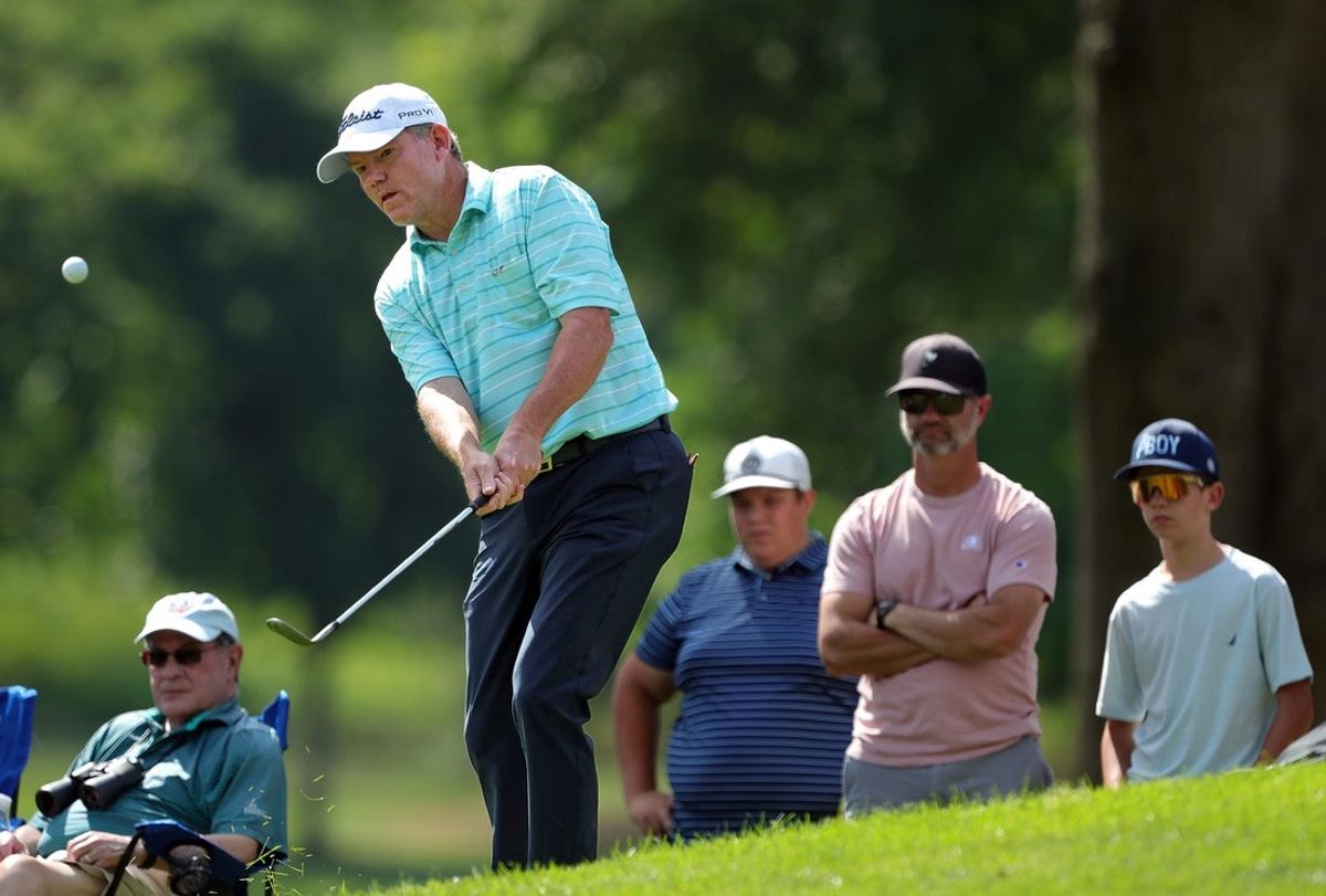 Shaun Micheel takes a shot onto the No. 1 green during the second round of the 2023 Kaulig Companies Championship at Firestone Country Club, Friday, July 14, 2023, in Akron, Ohio.